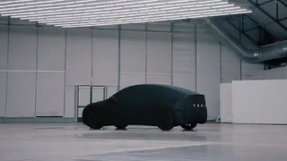 Here's the Tesla Model Y Under a Sheet: It's a Big Hatchback<em></em>
